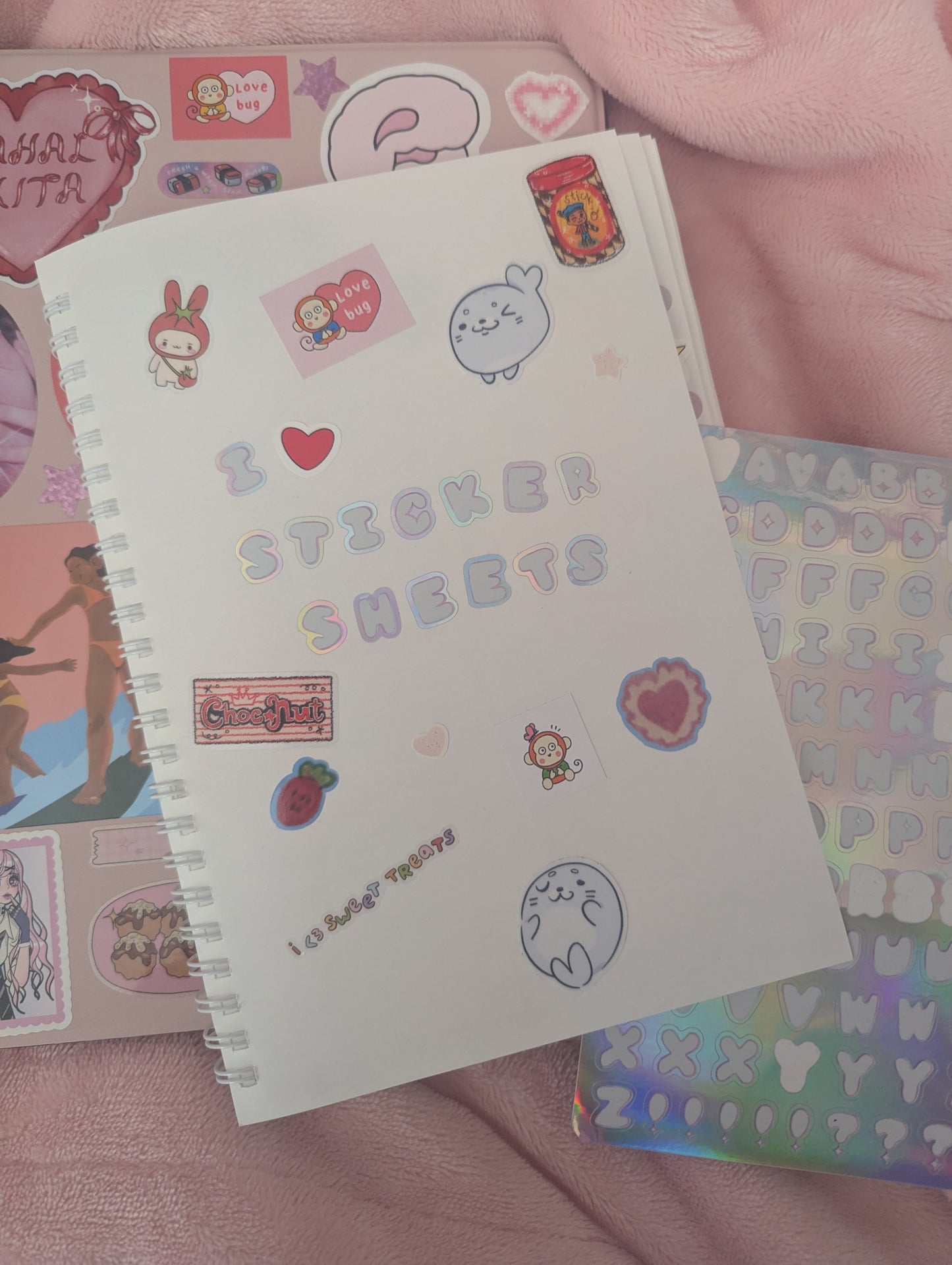 Holographic letter sticker sheets
